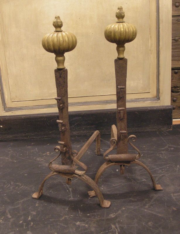 al140 pair of iron and brass fire dogs, measures h cm 61 x 41 depth.